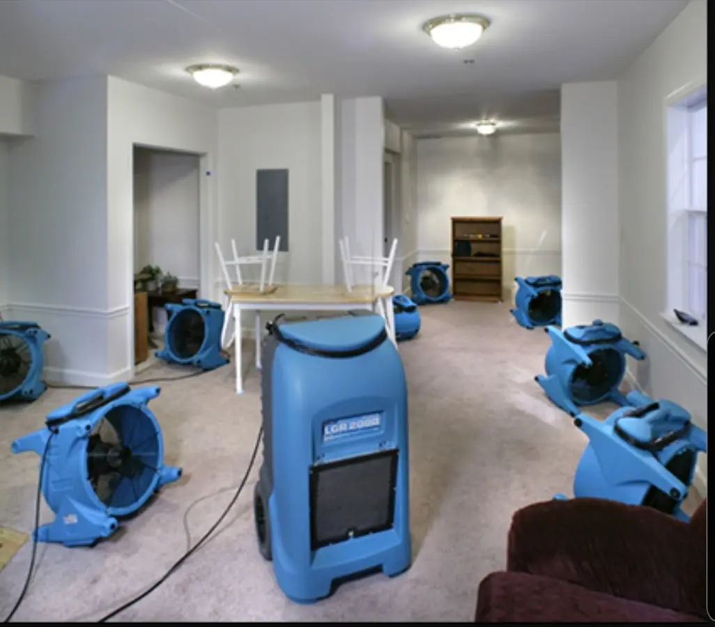 Air movers and dehumidifier setup for Water Damage Restoration in Florence